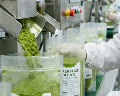 Superfood blend being packaged in a factory setting